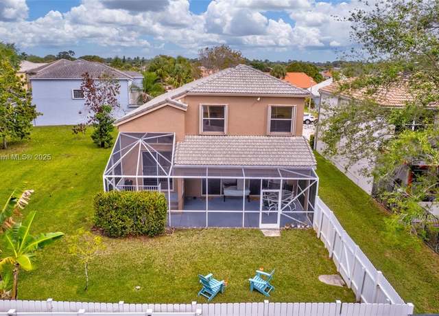 Property at 251 E Saratoga Blvd E, Royal Palm Beach, FL 33411, 4 beds, 3 baths