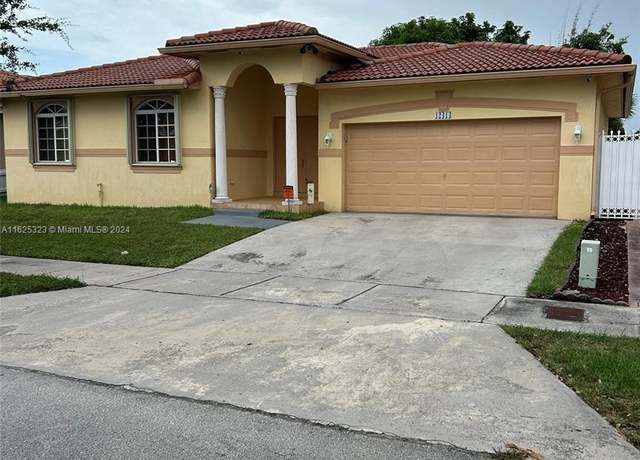 Property at 12414 SW 213th St, Miami, FL 33177, 3 beds, 2 baths