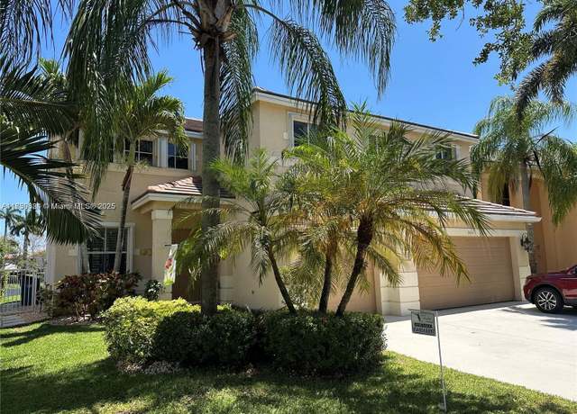Property at 3844 Falcon Ridge Cir, Weston, FL 33331, 5 beds, 3 baths