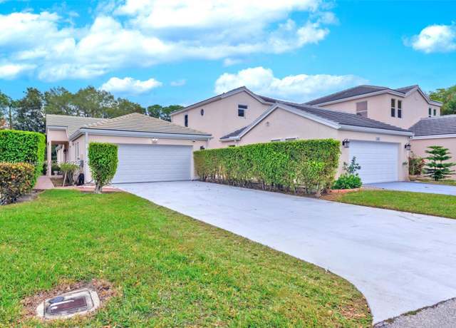 Property at 1009 Island Manor Dr, Green Acres, FL 33413, 3 beds, 2 baths