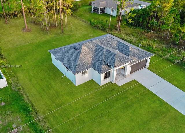 Property at 902 Magnolia Ave, Lehigh Acres, FL 33972, 3 beds, 2.5 baths