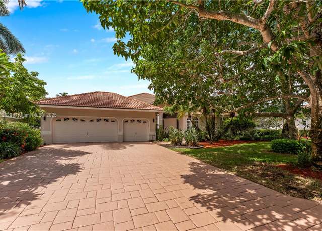 Property at 12180 NW 10th St, Coral Springs, FL 33071, 5 beds, 4.5 baths
