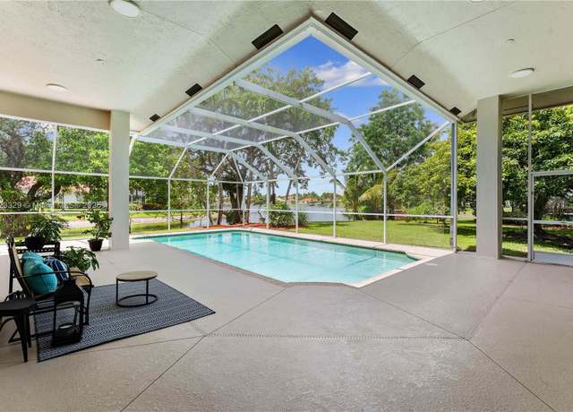 Property at 12180 NW 10th St, Coral Springs, FL 33071, 5 beds, 4.5 baths
