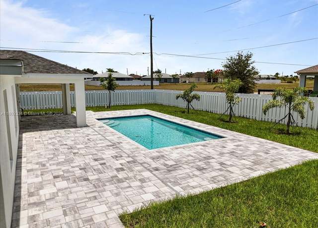 Property at 1016 NW 14th Ter, Cape Coral, FL 33993, 4 beds, 3 baths