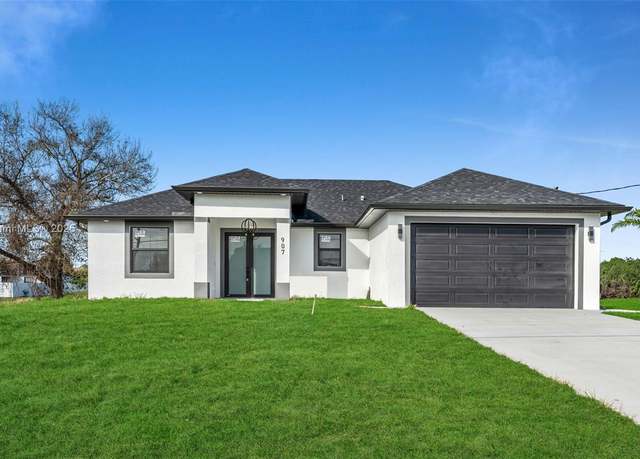Property at 907 Chaplin Ave, Lehigh Acres, FL 33971, 3 beds, 2 baths