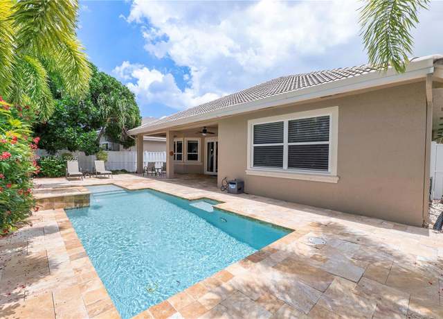 Property at 6017 NW 56th Cir, Coral Springs, FL 33067, 4 beds, 2 baths