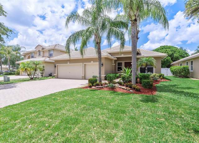 Property at 6017 NW 56th Cir, Coral Springs, FL 33067, 4 beds, 2 baths