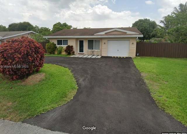 Property at 3190 NW 66th Dr, Fort Lauderdale, FL 33309, 4 beds, 3 baths