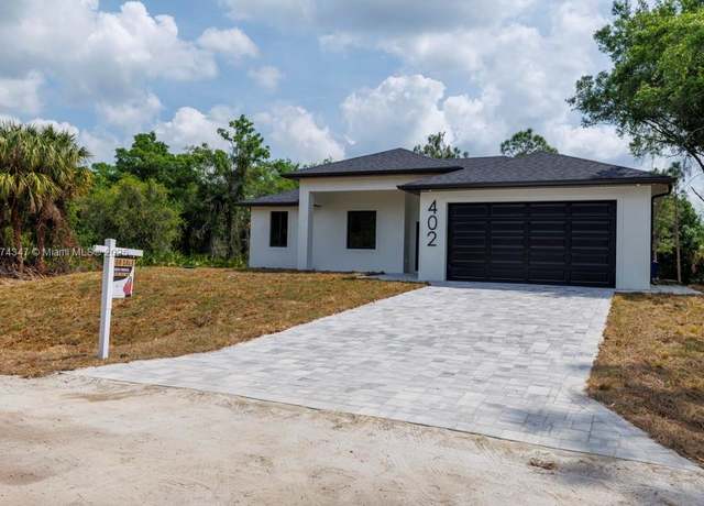 Property at 402 Thompson Ave, Lehigh Acres, FL 33972, 4 beds, 2 baths