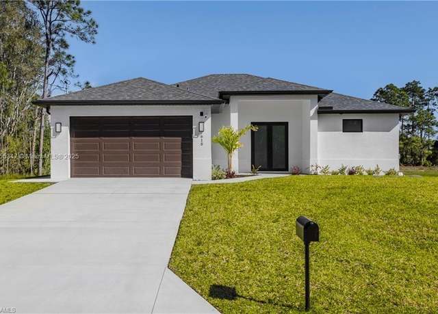 Property at 615 Addison St E, Lehigh Acres, FL 33974, 3 beds, 2 baths