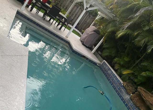 Property at 10377 Lima St, Cooper City, FL 33026, 4 beds, 2.5 baths