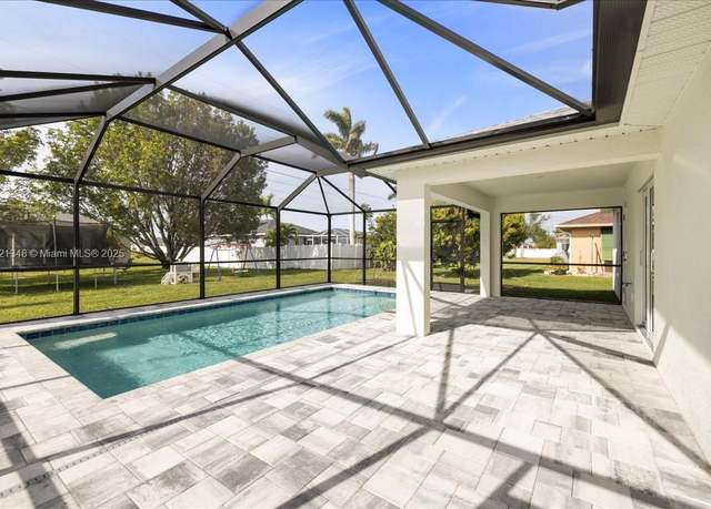 Property at 1122 NW 1st Ave, Cape Coral, FL 33993, 4 beds, 3 baths