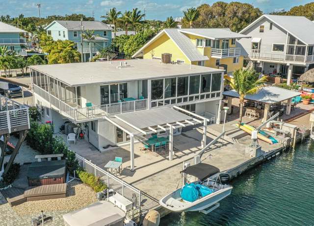 Property at 1207 Mockingbird Rd, Key Largo, FL 33037, 4 beds, 4.5 baths
