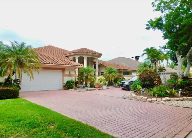 Property at 12022 Classic Dr, Coral Springs, FL 33071, 5 beds, 3 baths