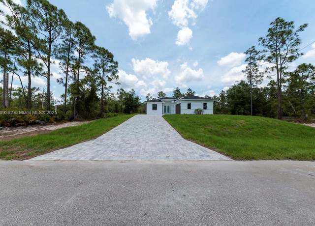 Property at 719 Almelia Street East, Lehigh Acres, FL 33974, 3 beds, 2 baths