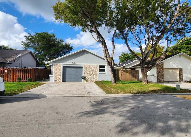 Property at 9711 SW 57th St, Cooper City, FL 33328, 3 beds, 2 baths