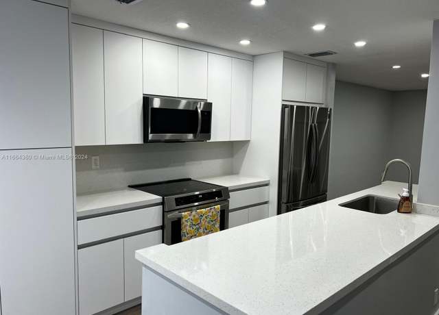 Property at 8223 NW 8th St #11, Plantation, FL 33324, 4 beds, 2.5 baths
