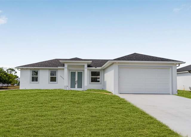 Property at 2506 5th St SW, Lehigh Acres, FL 33976, 3 beds, 2 baths