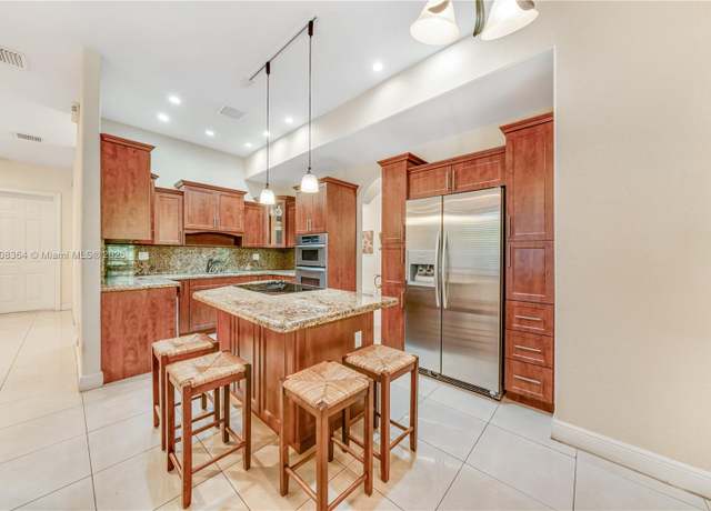 Property at 2913 SW 13th St, Miami, FL 33145, 5 beds, 4.5 baths