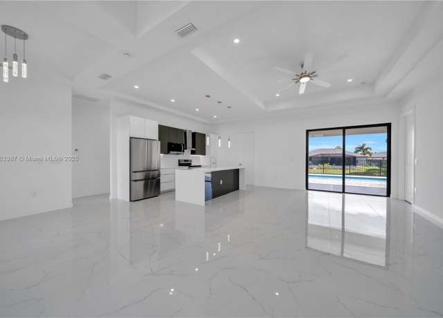 Property at 2318 NW 30th Ter, Cape Coral, FL 33993, 4 beds, 3 baths