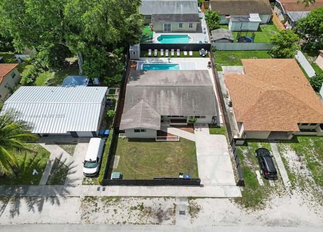 Property at 560 NE 161st St, Miami, FL 33162, 4 beds, 2 baths