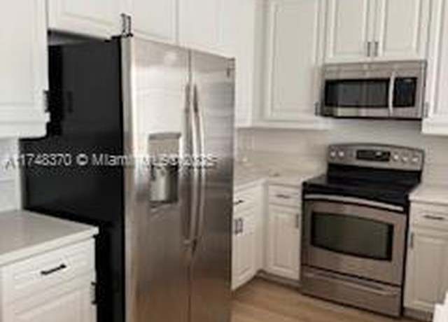 Property at 553 NW 39th Cir, Boca Raton, FL 33431, 3 beds, 3.5 baths