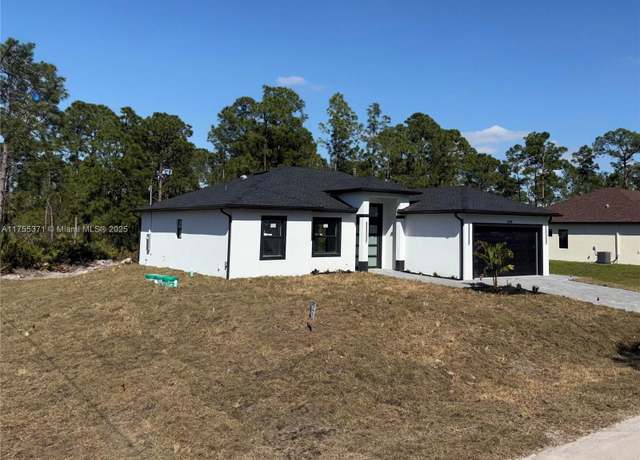 Property at 1206 W 11th St, Lehigh Acres, FL 33972, 3 beds, 2 baths