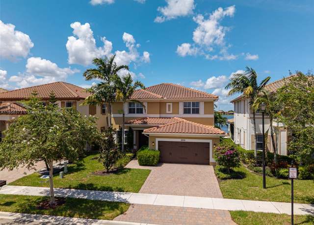 Property at 9709 Blue Isle Bay, Parkland, FL 33076, 4 beds, 4 baths