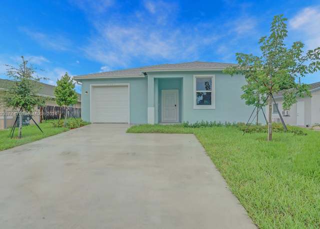 Property at 344 Fleming Ave, Green Acres, FL 33463, 3 beds, 2 baths