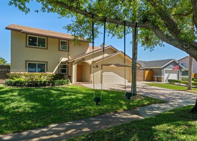Property at 4890 SW 104th Ave, Cooper City, FL 33328, 4 beds, 2.5 baths