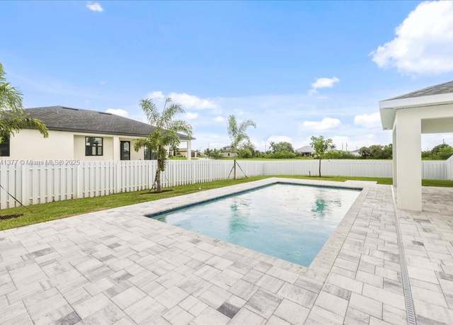 Property at 1136 NW 9th Ter, Cape Coral, FL 33993, 4 beds, 3 baths