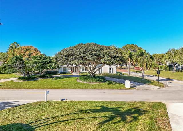 Property at 444 Glenbrook Dr, Atlantis, FL 33462, 4 beds, 4 baths