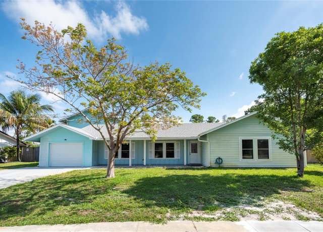 Property at 219 Bobwhite Rd, Royal Palm Beach, FL 33411, 4 beds, 3.5 baths