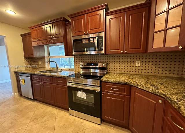 Property at 9331 NW 25th St, Sunrise, FL 33322, 3 beds, 2 baths