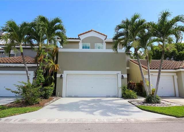 Property at 12056 NW 56th St, Coral Springs, FL 33076, 4 beds, 2.5 baths