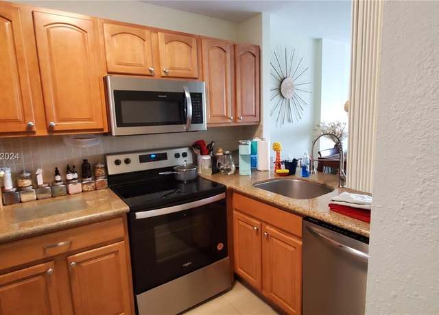 Property at 111 Royal Park Dr Unit 4F, Oakland Park, FL 33309, 2 beds, 2 baths