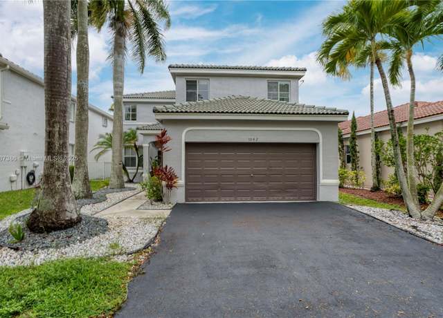 Property at 1042 Bluewood Ter, Weston, FL 33327, 5 beds, 3.5 baths