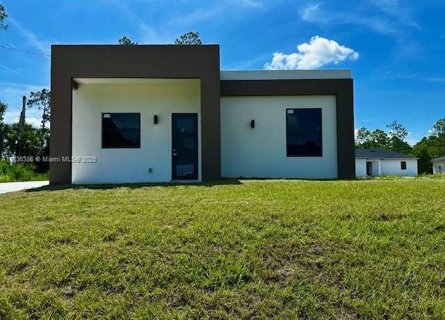 Property at 323 Mangonia Ave, Lehigh Acres, FL 33974, 2 beds, 2 baths