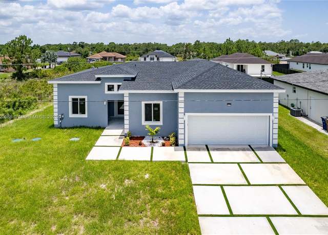 Property at 2809 55nd St W, Lehigh Acres, FL 33971, 4 beds, 2.5 baths