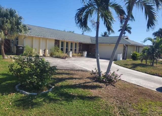 Property at 900 S Mangonia Cir, West Palm Beach, FL 33401, 3 beds, 2 baths