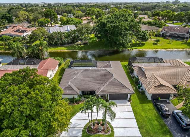 Property at 11396 NW 3rd Pl, Coral Springs, FL 33071, 4 beds, 2.5 baths