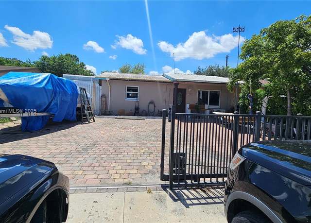 Property at 5940 S 38th Ct, Green Acres, FL 33463, 3 beds, 2 baths