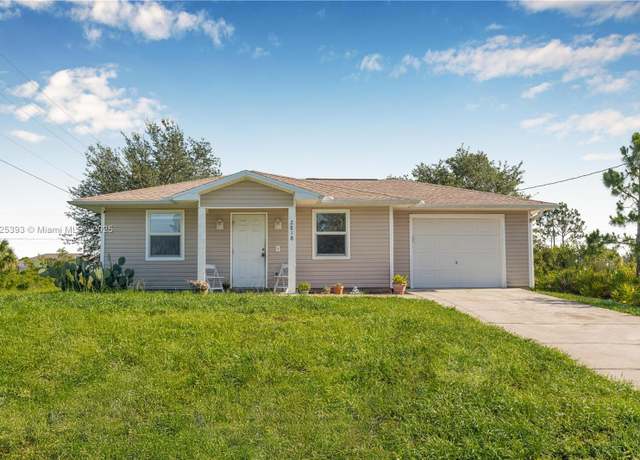 Property at 2818 W 66th St, Lehigh Acres, FL 33971, 3 beds, 2 baths