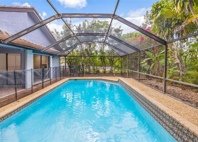 Property at 9033 NW 47th Ct, Coral Springs, FL 33067, 4 beds, 3 baths