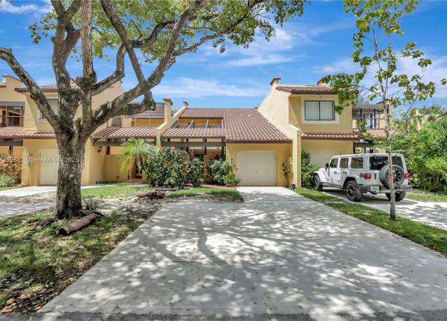 Property at 9845 Costa Del Sol Blvd Unit B-103, Doral, FL 33178, 2 beds, 2.5 baths