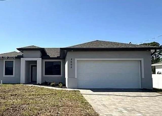 Property at 311 Radium Ave, Lehigh Acres, FL 33974, 3 beds, 2 baths