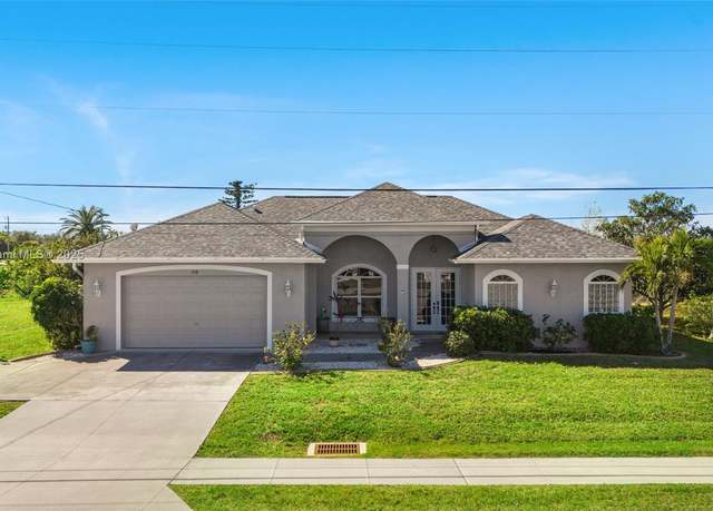 Property at 228 Nicholas Pkwy E, Cape Coral, FL 33990, 3 beds, 3 baths