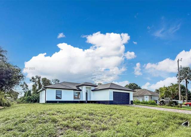 Property at 310 Rainier Ave, Lehigh Acres, FL 33974, 3 beds, 3 baths