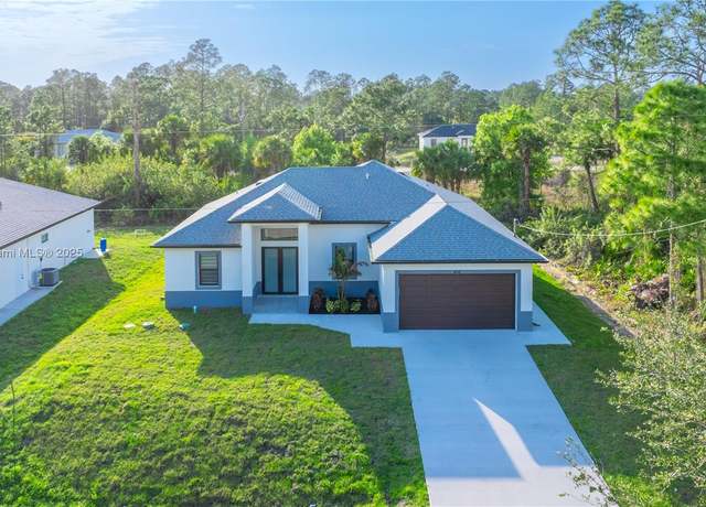 Property at 432 Mallory Ave S, Lehigh Acres, FL 33974, 4 beds, 2 baths