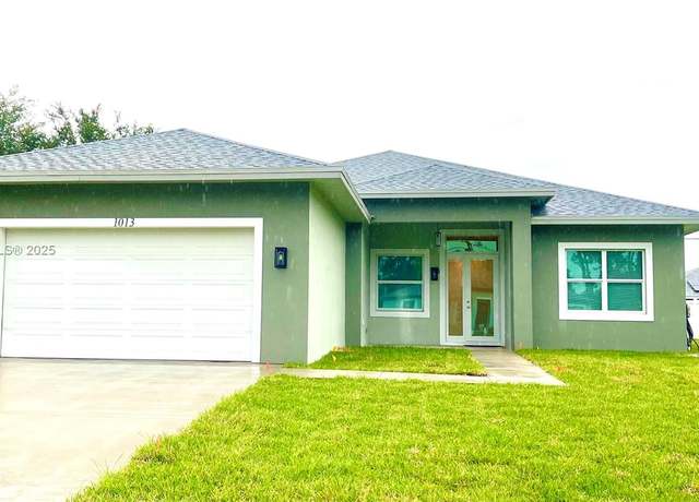 Property at 1013 SW Deauville Ave, Port St Lucie, FL 34953, 4 beds, 3 baths